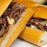 Hot Roast Beef · Roast Beef with Au Jus on a Kaiser Roll