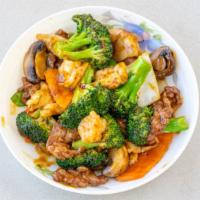 Triple Delight · Hot and spicy. Shrimp, beef & chicken sauteed with broccoli, snow peas, mushroom & baby corn.