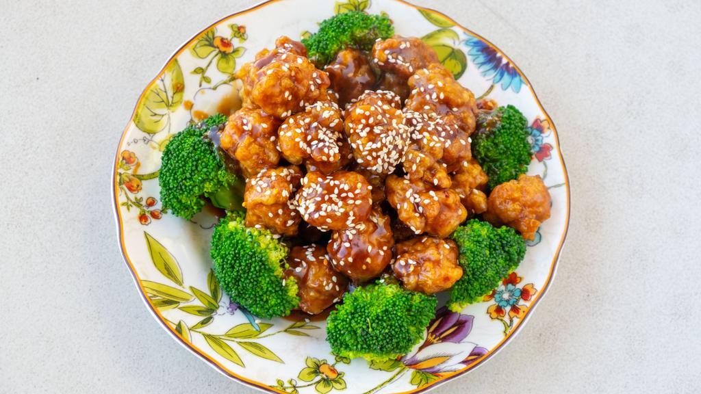 Orange Or Sesame Chicken  · Hot and spicy. Sliced of chicken fried in peanuts oil sauteed in sweet orange fragrant spicy sauce or hot and spicy tender slices of chicken sauteed with sesame sauce, sprinkled with sesame seeds.
