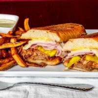 Cuban Sandwich · Braised pork, ham, pickles, Swiss cheese, mustard sauce.