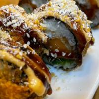 Crunchy Cream Maki · Crispy sushi roll, inside have fried sweet potatoes with cucumbers ,seaweed salad , cream ch...