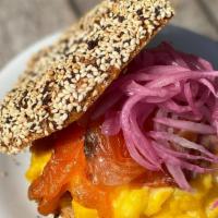 Leo Bagel Sandwich · Bagel with scrambled eggs, house smoked nova lox, and pickled onion.