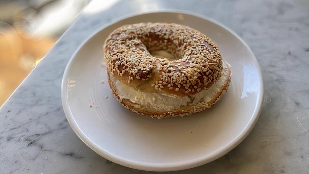 Bagel Sesame With Cream Cheese · Sesame bagel with a schmear of cream cheese