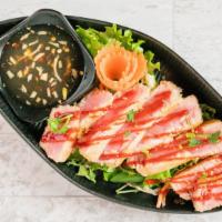 *Seared Saigon Tuna · Raw in center tuna steak.