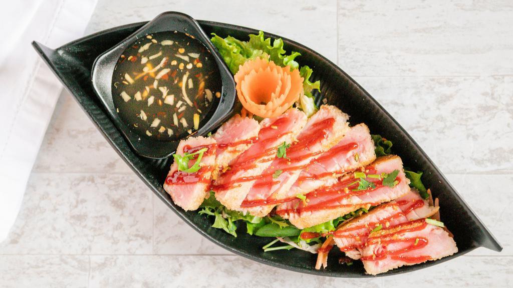 *Seared Saigon Tuna · Raw in center tuna steak.