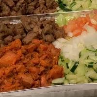Chicken & Lamb Combo Over Rice Or Salad · White sauce Hot sauce or Green sauce