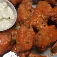Boneless Wings · Served with blue cheese or ranch and celery.