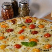 Heirloom Tomato & Fresh Mozzarella · Garlic sauce pizza with fresh garlic, topped with a sprinkle of our aged Mozzarella and dice...