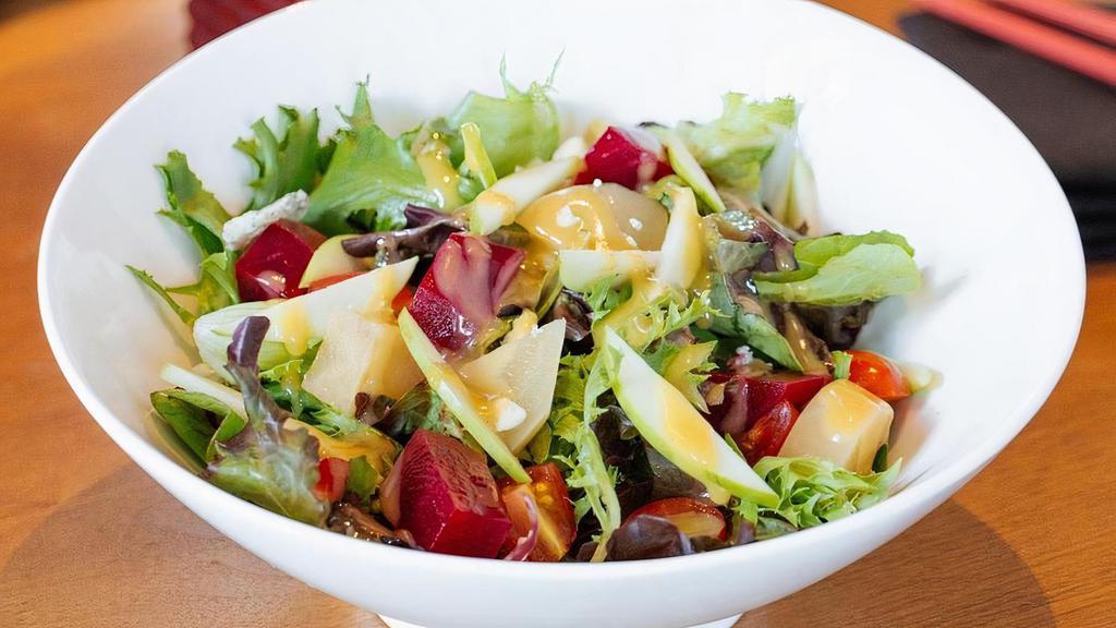 Beet Salad · red and golden beets, field greens, tomato, bleu cheese, granny smith apples, honey mustard dressing