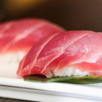 Salmon Lovers · 2 pieces toro (prime cut tuna), nigiri, 2 torched toro nigiri, 2 tuna sashimi, 2 tuna nigiri...