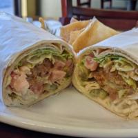 Kebab Wrap · Grilled chicken, grilled onions and peppers, hummus, lettuce, tomato.