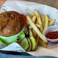 Smashed Chicken Burger · house made smashed ground chicken patty, Vermont White Cheddar, bibb lettuce, raw onion, tom...