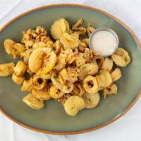Crispy Calamari · fried with our own pepperoncini, preserved lemon and zucchini – grilled lemon thyme aioli