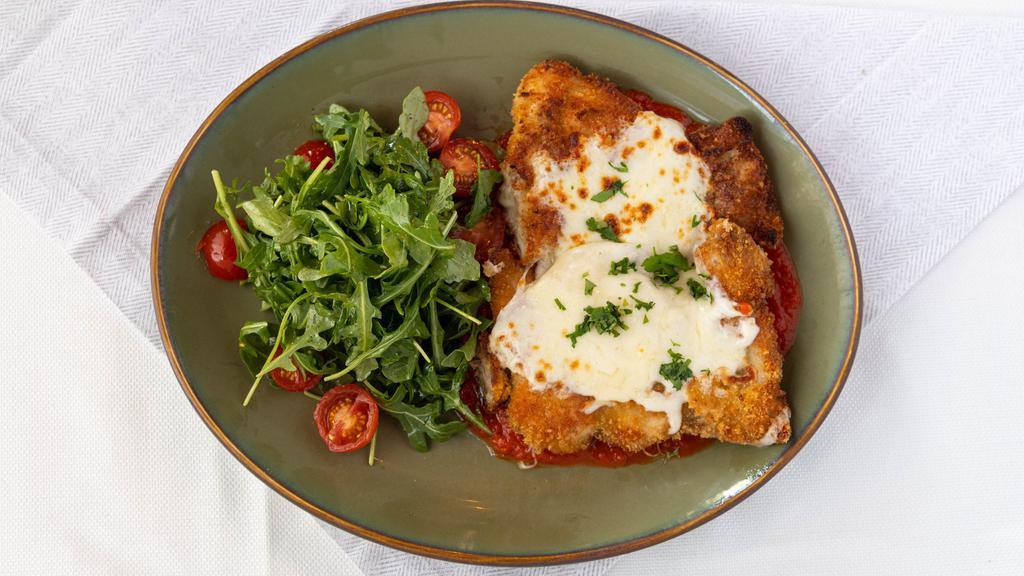 Pollo Alla Parmigiana · chicken cutlet, tomato basil sugo, mozzarella, parmigiano reggiano, arugula and cherry tomato salad
