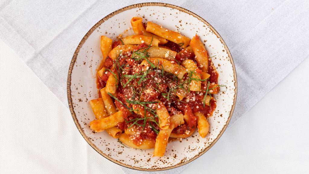 Tufoli Al Pomodoro · elbow pasta, san marzano tomato sugo, grana padano, basil (gluten free gnocchi available)