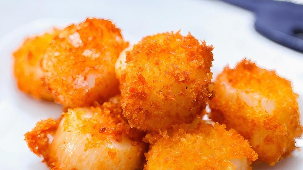 Fried Scallops (11) · 11 pieces. Coated with seasoned flour and bread crumbs and deep fried to perfection.
