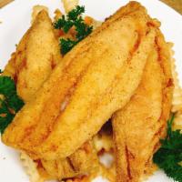 Red Snapper · Crispy fried red snapper fillet, served with two side dishes and bread on the side. We fry i...