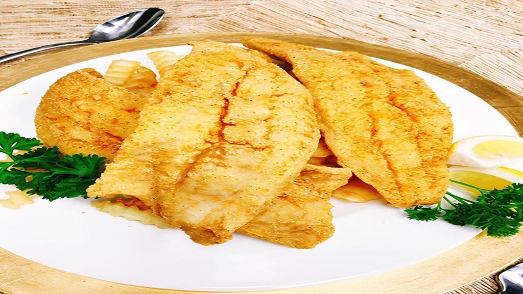 Whiting · Crispy fried whiting fillet, served with bread on the side. We fry in premium canola oil.