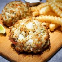Crab Cake (2) · Two pieces. Fried crab cake, made with real jumbo lump crabmeat, served with two side dishes...