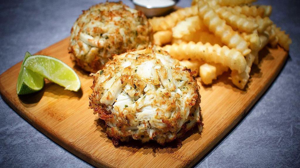 Crab Cake (2) · Two pieces. Fried crab cake, made with real jumbo lump crabmeat, served with two side dishes and a choice of bread on the side. We fry in premium canola oil.
