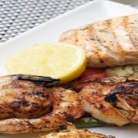 Baked Salmon & Grilled Shrimp · Comes with baked salmon and grilled jumbo shrimp, served with two side dishes and choice of ...