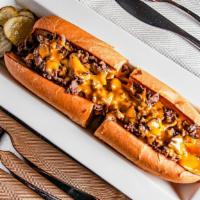 South Philly Cheesesteak · Philadelphia cheesesteak on a long roll with cheese whiz or a choice of cheddar, Monterey ja...