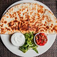 Jamaican Jerk Chicken Quesadilla · Mexican answer to the grilled cheese sandwich on a crispy tortilla, Filled with jerk chicken...