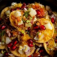 Papri Chaat · Homemade chips, potatoes, chickpeas, yogurt and tamarind sauce. ( VEG )