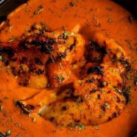 Chicken Tikka Masala · Chicken cubes pieces cooked in tikka masala sauce. Aromatic blends of creamy tomato sauce, d...