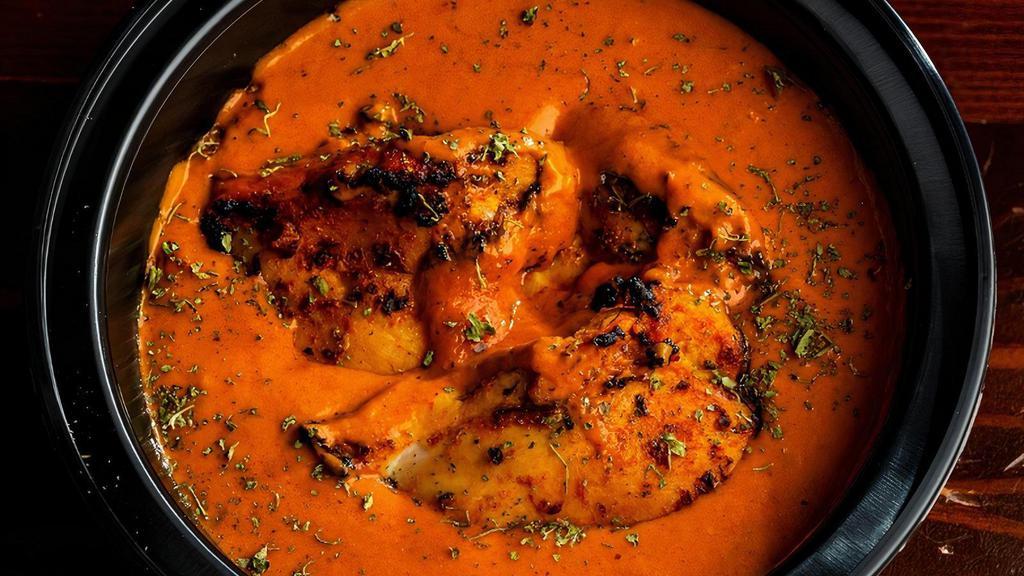 Chicken Tikka Masala · Chicken cubes pieces cooked in tikka masala sauce. Aromatic blends of creamy tomato sauce, dry fenugreek leaves and spices. (GF) Served with Basmati Rice.