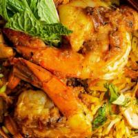 Shrimp Biryani · An aromatic blend of fragrant Saffron basmati rice with exotic spices flavorful aroma of cum...