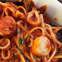 Linguine Alla Pescatore · shrimp, scallops, mussels, clams, and calamari
in a red, white or fra diavolo sauce
