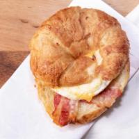 Bacon, Egg & Cheese · Go the extra mile by bringing bacon to your Dunkin' Breakfast Sandwich. Bacon with egg and c...