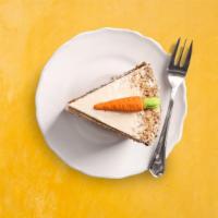 Carrot Cake · The perfect balance of cinnamon, nuts, pineapple smothered over the cream cheese frosting.