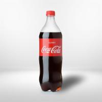 Soda Bottle (2 Ltrs) · Your favorite carbonated beverage in a bottle.