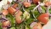 Arabic Salad · Fresh chopped tomatoes, cucumbers, lettuce, onion, green peppers, radish with pomegranate dr...