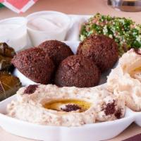 Ny Falafel  · Recipes from the famous streets of new york. All platters served on seasoned brown rice, whi...