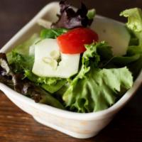 Green Salad · Lettuce, tomato, cucumber with ginger dressing.
