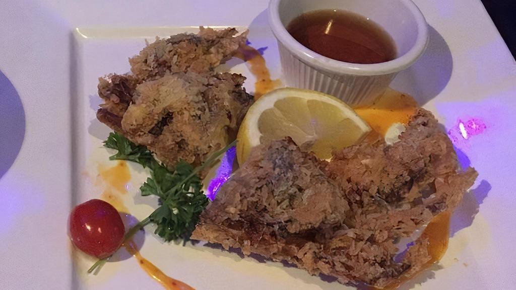 Soft Shell Crab · Deep fried soft shell crab with dipping sauce on the side.