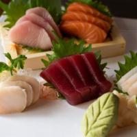 Sushi Regular · 8 pieces assorted sushi with one roll choice of tuna roll or salmon avocado roll or Californ...