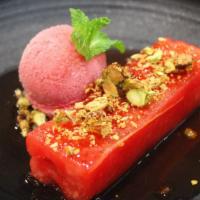 Caramelized Watermelon  · watermelon and strawberry coulis, lime sorbet, pistachip crumble
