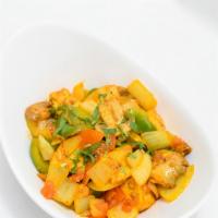 Chicken Mushroom Balti · Chicken with roasted onions, green peppers, mushrooms, herbs and spices, garnished with cori...