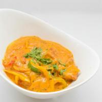 Madrasi Fish · Fresh swordfish cooked in a curry sauce with mushrooms, green peppers and onions.