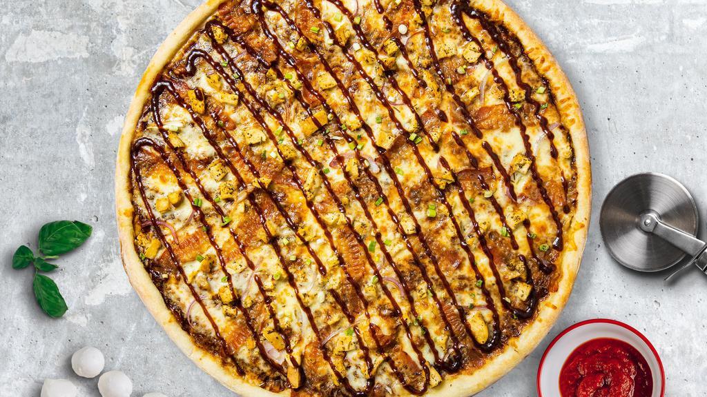 Bbq Butcher Pizza  · BBQ sauce, grilled chicken, and fresh cheese baked on a hand-tossed dough.  Served with a side of blue cheese or ranch dressing.