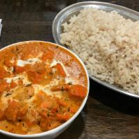 Chicken Tikka Masala · Tandoori style, boneless diced chicken breast cooked in A rich tomato creamy sauce finished ...