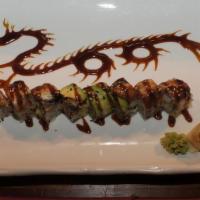 Dragon Roll · California roll topped with eel and avocado.