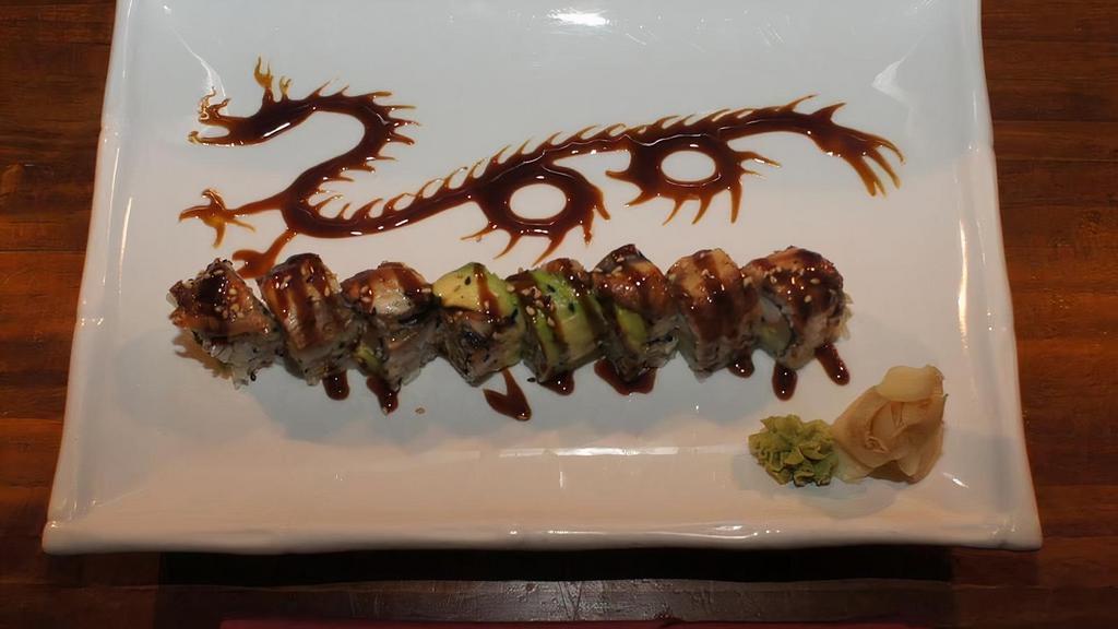 Dragon Roll · California roll topped with eel and avocado.