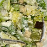 Caesar Salad · Romaine, croutons, marinated white anchovy.