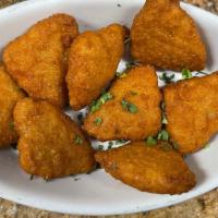 Mac & Cheese Bites · 8 Pieces Mac n Cheese Bites served with a side of marinara sauce