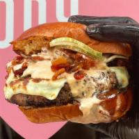 Sophie'S Bbq Burger · House blend patty (sirloin, brisket, chuck), candied bacon, Cooper sharp, KC BBQ sauce, sign...